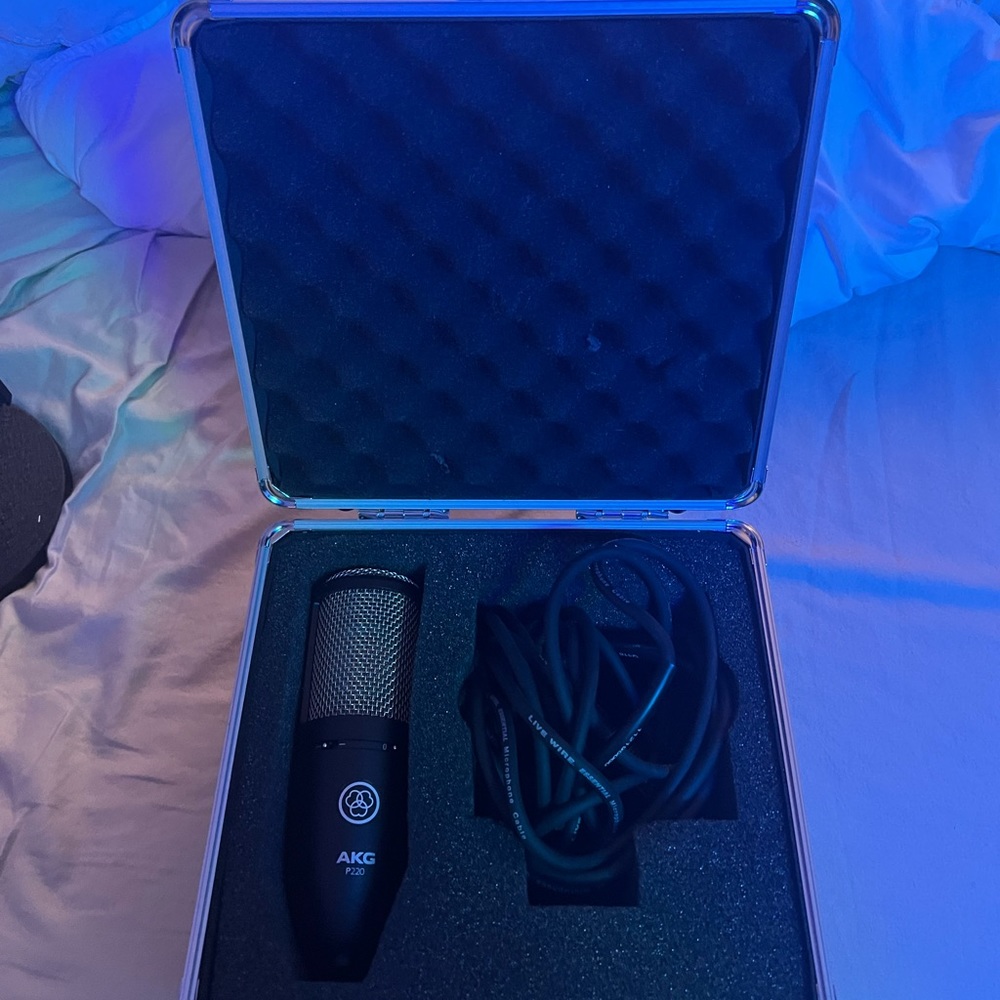 akg p220 microphone with stand, filter, extender, and carrying case